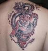 chinese dragon and lion tats